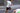 Man with white t-shirt and dark shorts